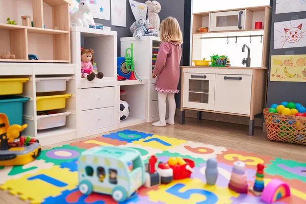 Adorable Blonde Girl Playing Toys Standing Kindergarten — 스톡 사진