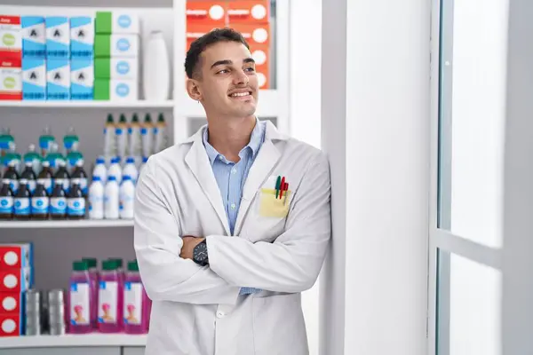 Young Hispanic Man Pharmacist Smiling Confident Standing Arms Crossed Gesture — 스톡 사진