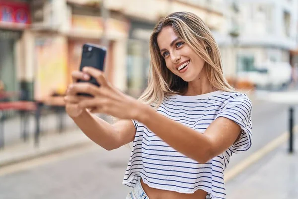 Young Blonde Woman Smiling Confident Making Selfie Smartphone Street — Fotografia de Stock