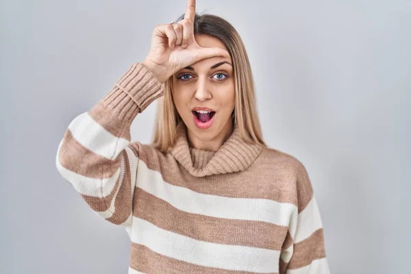 Young Blonde Woman Wearing Turtleneck Sweater Isolated Background Making Fun — Stock Photo, Image
