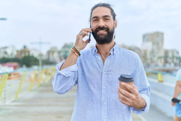 Young Hispanic Man Talking Smartphone Drinking Coffee Street — Foto Stock