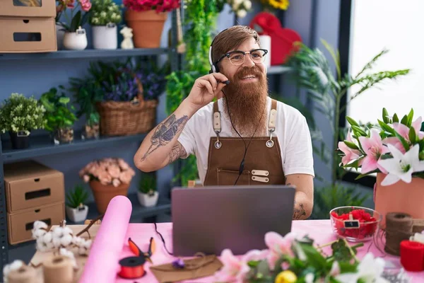 Young Redhead Man Florist Using Headset Laptop Working Flower Shop — Photo