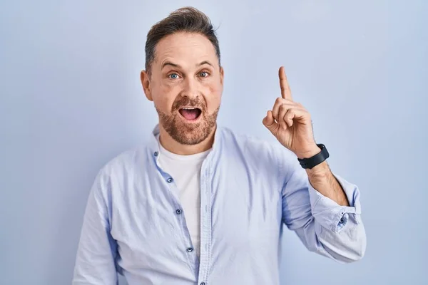 Middle Age Caucasian Man Standing Blue Background Pointing Finger Successful — Stock Photo, Image