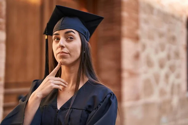 Young Hispanic Woman Wearing Graduated Uniform Standing Relaxed Expression University — Foto de Stock