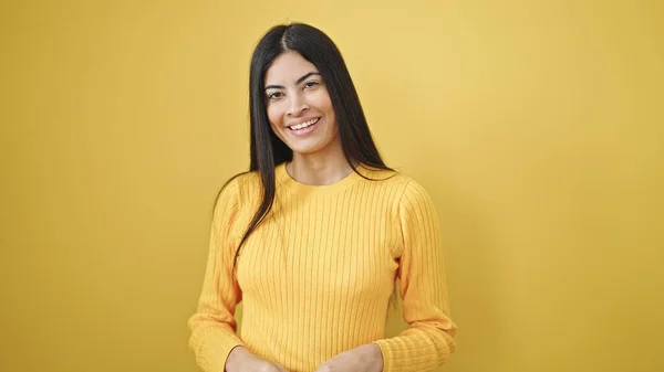 stock image Young beautiful hispanic woman smiling confident standing over isolated yellow background