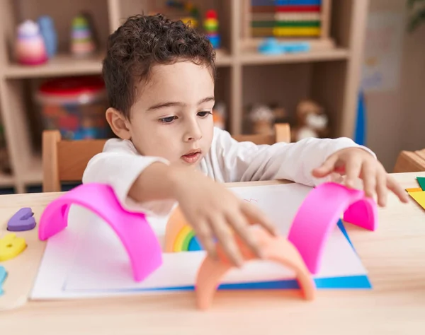 Adorable Hispanic Boy Playing Toys Sitting Table Kindergarten — Stock Photo, Image