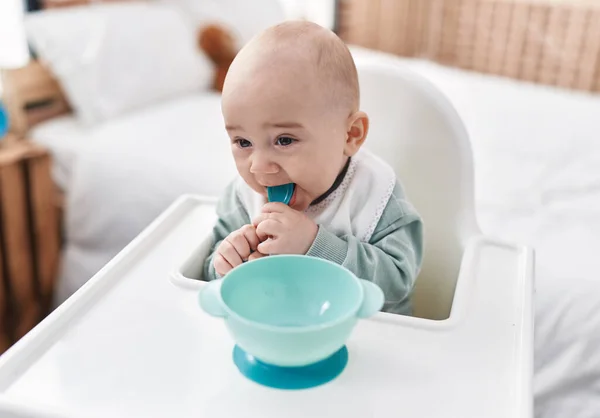 Adorable Caucasian Baby Sitting Highchair Sucking Spoon Bedroom — Stock Photo, Image