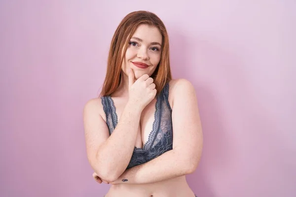 Redhead Woman Wearing Lingerie Pink Background Looking Confident Camera Smiling — Stock Photo, Image