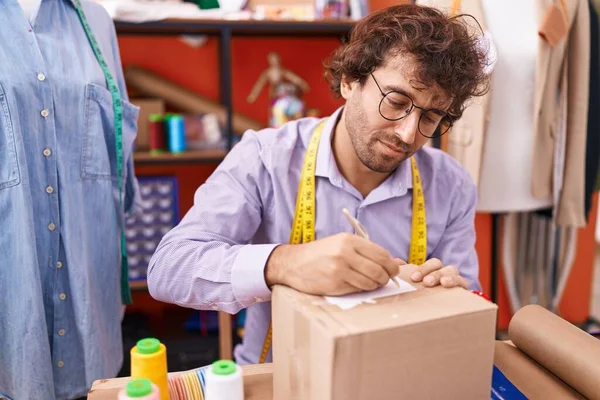 Young Hispanic Man Tailor Writing Package Atelier — Stock Photo, Image