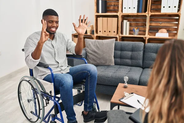 African American Man Doing Therapy Sitting Wheelchair Showing Pointing Fingers — Stock Photo, Image