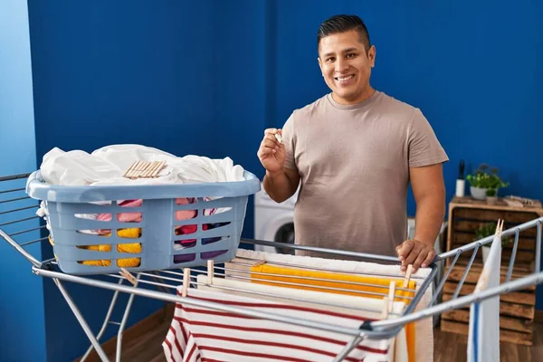 Young Latin Man Smiling Confident Hanging Clothes Clothesline Laundry Room — Stock Photo, Image