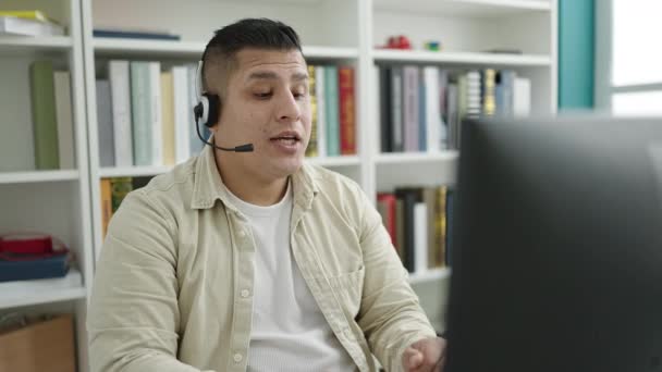 Young Hispanic Man Student Smiling Confident Having Video Call Library — Stock Video