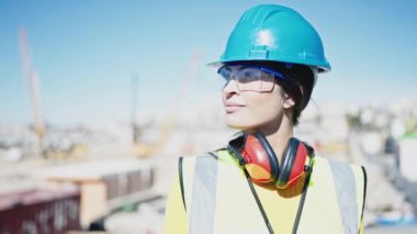 Young beautiful hispanic woman architect smiling confident standing at street