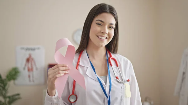 Young Beautiful Hispanic Woman Doctor Smiling Confident Holding Pink Ribbon — Stock Photo, Image