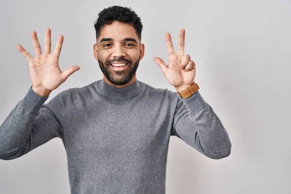 Hispanic Man Beard Standing White Background Showing Pointing Fingers Number — ストック写真