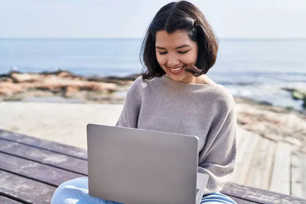 Young Woman Using Laptop Sitting Bench Seaside — Stockfoto