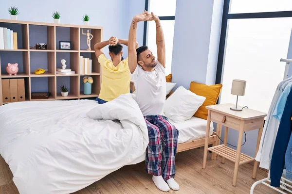 Two Man Couple Waking Stretching Arms Sitting Bed Bedroom — ストック写真