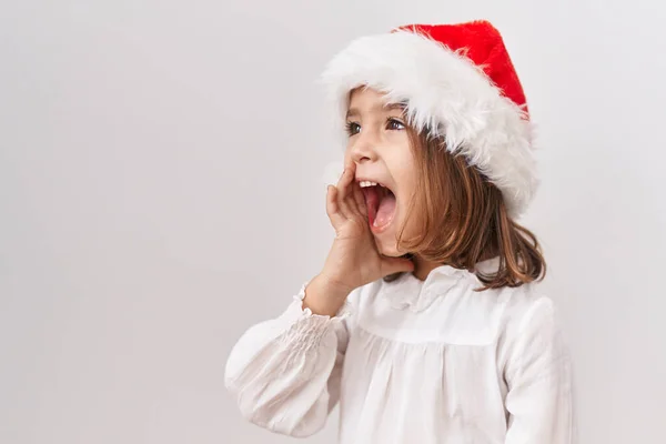 Μικρό Ισπανόφωνο Κορίτσι Που Φοράει Χριστουγεννιάτικο Καπέλο Ανίδεο Και Μπερδεμένο — Φωτογραφία Αρχείου