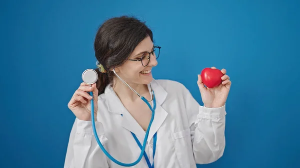 Young Beautiful Hispanic Woman Doctor Holding Stethoscope Heart Isolated Blue — Stock Photo, Image