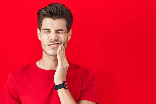 Young Hispanic Man Standing Red Background Touching Mouth Hand Painful — Stock Photo, Image
