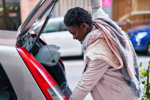 African American Woman Smiling Confident Opening Car Trunk Door Street — Foto Stock