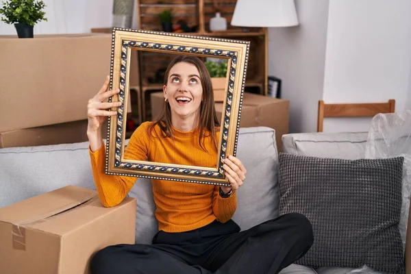Young Caucasian Woman New Home Holding Empty Frame Angry Mad — Stock Photo, Image