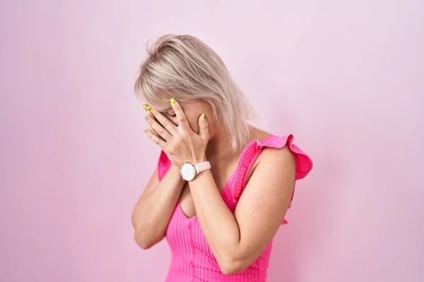 Young Caucasian Woman Standing Pink Background Sad Expression Covering Face — Stok fotoğraf