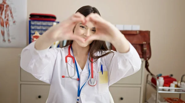 Young Beautiful Hispanic Woman Doctor Doing Heart Gesture Hands Clinic — Stock Photo, Image