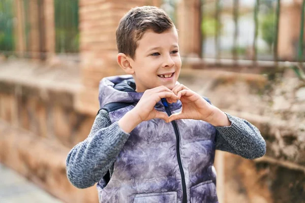 Blond Child Smiling Confident Doing Heart Gesture Hands Street — Foto Stock