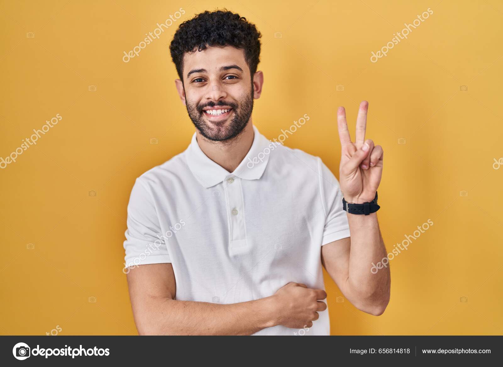 Arab Man Standing Yellow Background Smiling Happy Face Winking Camera —  Stock Photo © Krakenimages.com #656814818