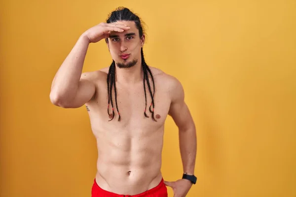 Hispanic Man Long Hair Standing Shirtless Yellow Background Worried Stressed — Stock Photo, Image