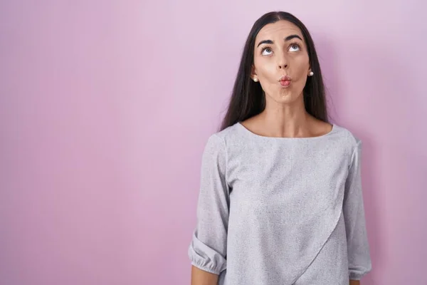 Young Brunette Woman Standing Pink Background Making Fish Face Lips — 스톡 사진