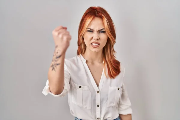 Young Caucasian Woman Standing Isolated Background Angry Mad Raising Fist — 图库照片