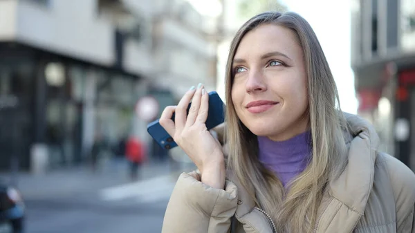 Young Blonde Woman Smiling Confident Listening Audio Message Smartphone Street — Stockfoto