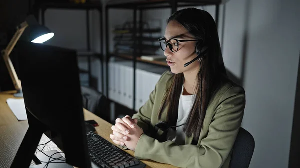 Young beautiful hispanic woman call center agent working at office