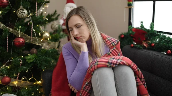 Young Blonde Woman Sitting Sofa Christmas Tree Sad Expression Home — Stock fotografie