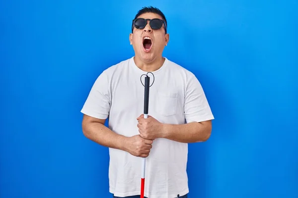 Hispanic Young Blind Man Holding Cane Angry Mad Screaming Frustrated — Stock Photo, Image
