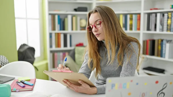 Young Caucasian Woman Student Writing Document Sitting Table Library University — Stock Photo, Image