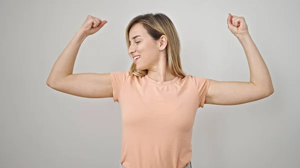 Young Blonde Woman Smiling Confident Doing Strong Gesture Arms Isolated — ストック写真