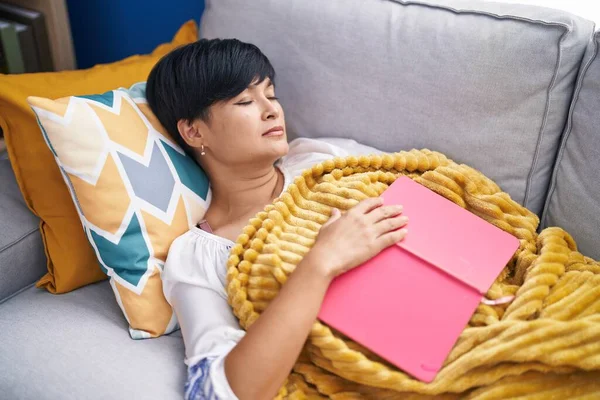 Middle Age Chinese Woman Holding Book Lying Sofa Sleeping Home — 스톡 사진