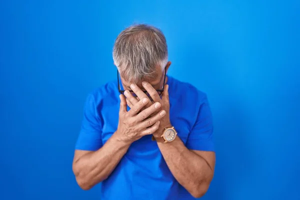 Hispanic Man Grey Hair Standing Blue Background Sad Expression Covering — Stock Photo, Image