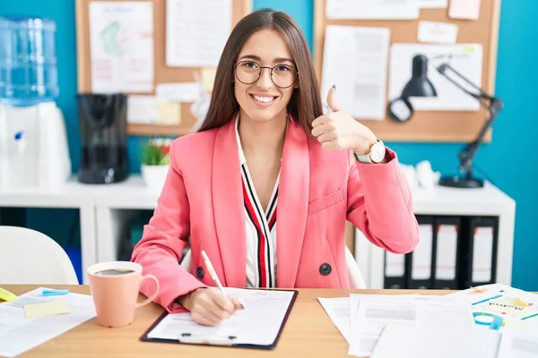 Young Hispanic Woman Working Office Wearing Glasses Doing Happy Thumbs — 스톡 사진