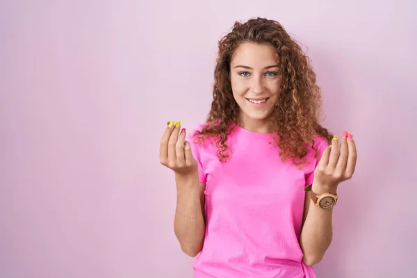 Young Caucasian Woman Standing Pink Background Doing Money Gesture Hands — Stockfoto