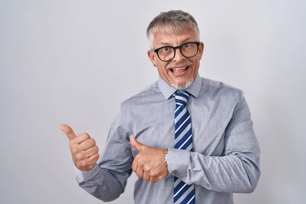 Hispanic Business Man Grey Hair Wearing Glasses Pointing Back Hand — Stock Photo, Image