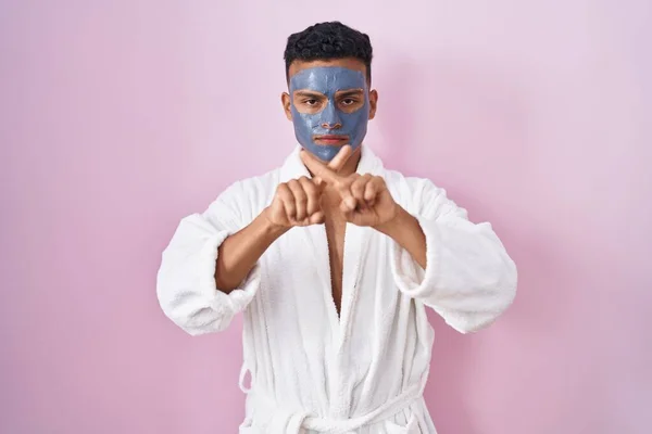 Young Hispanic Man Wearing Beauty Face Mask Bath Robe Rejection — Stock Photo, Image