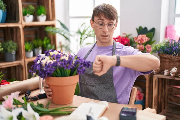 Caucasian Blond Man Working Florist Shop Looking Watch Time Worried — Stock Photo, Image