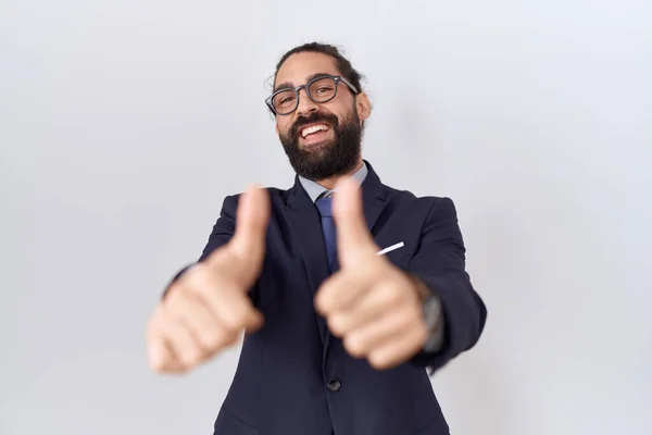 Hispanic Man Beard Wearing Suit Tie Approving Doing Positive Gesture — стоковое фото