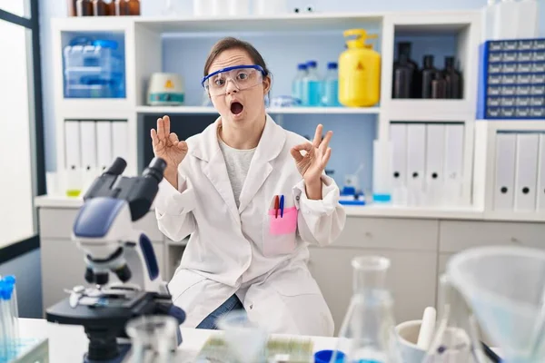 Hispanic Girl Syndrome Working Scientist Laboratory Looking Surprised Shocked Doing — Stock Photo, Image