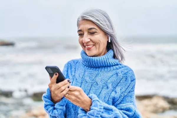 Middle Age Grey Haired Woman Smiling Confident Listening Music Seaside — Fotografia de Stock