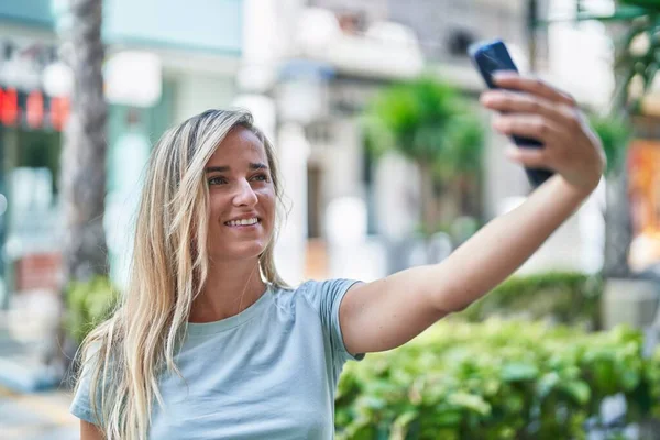 Young Blonde Woman Smiling Confident Making Selfie Smartphone Street — Fotografia de Stock